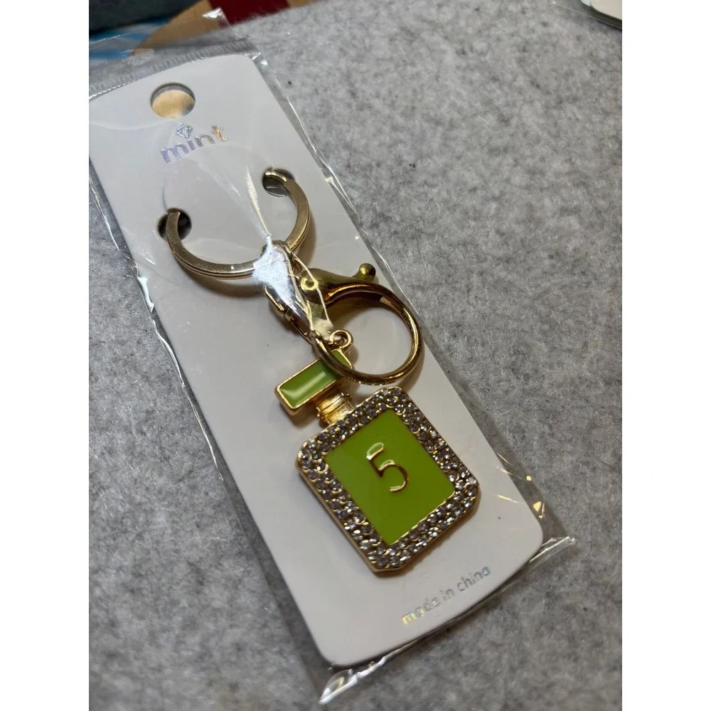 #7. Green Bag Charm Keychain Perfume Bottle-inspired